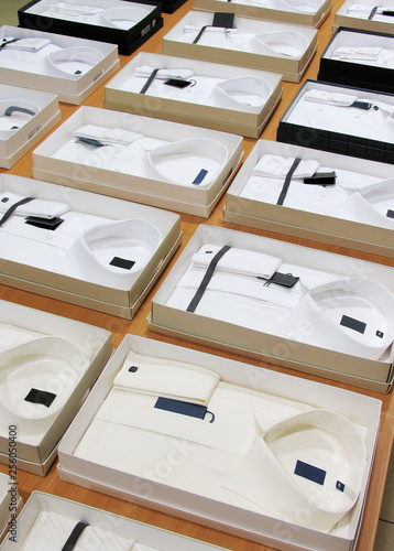 shelf with bent shirts