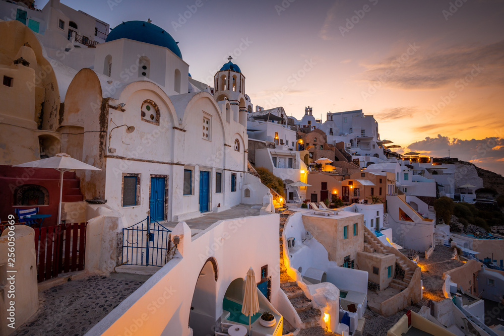 Fototapeta premium Santorini greece famous Oia in sunset time golden hour 