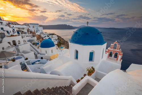 Santorini greece famous Oia in sunset time golden hour 