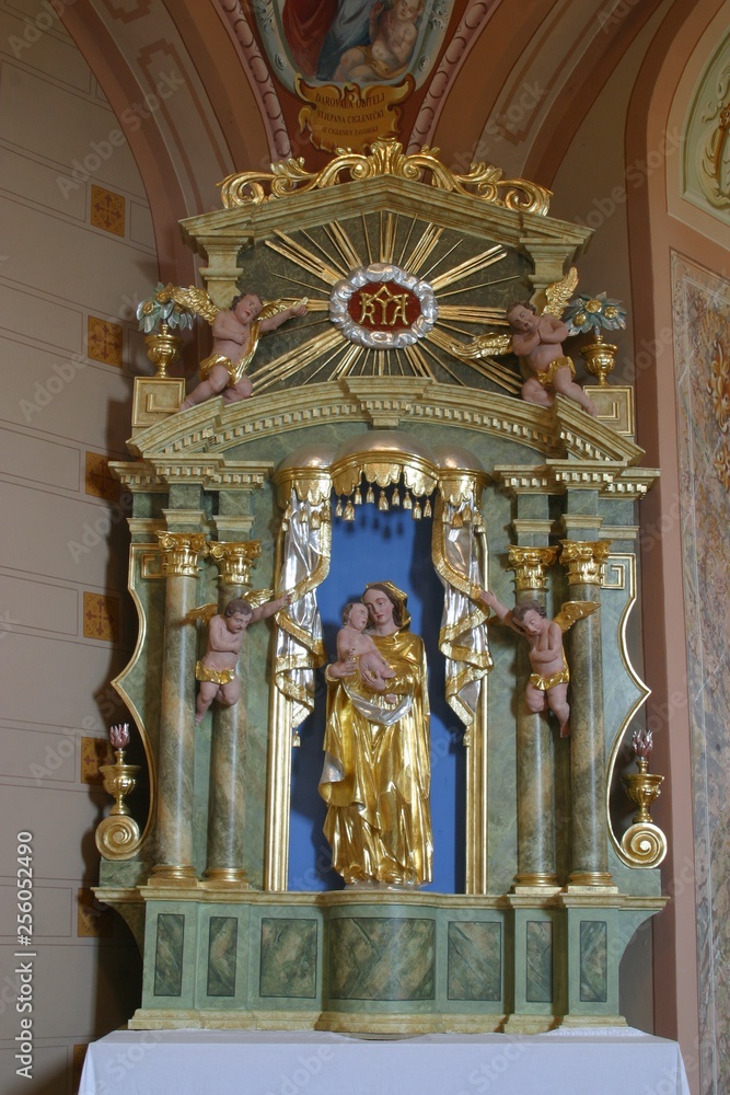 Virgin Mary with baby Jesus, statue on the altar in Chapel of Saint Vitus in Komor Zacretski, Croatia