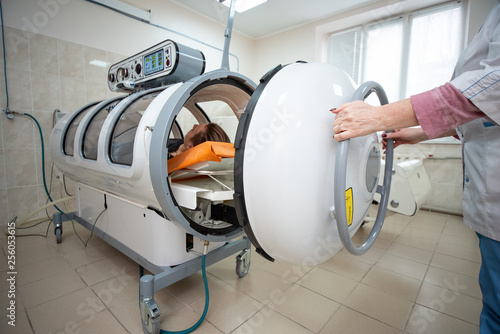 hyperbaric chamber, treatment and recovery of the body by supplying pure oxygen, the patient's interest in the hospital photo