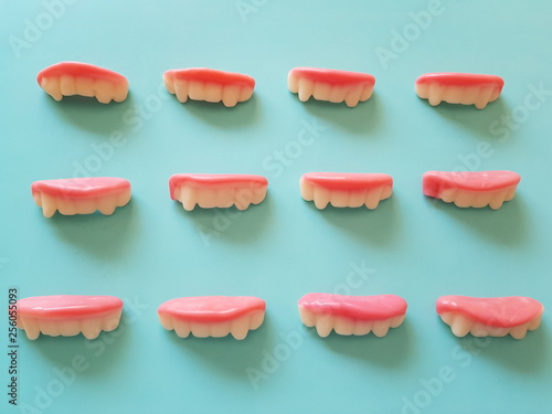 Gummy teeth on blue background