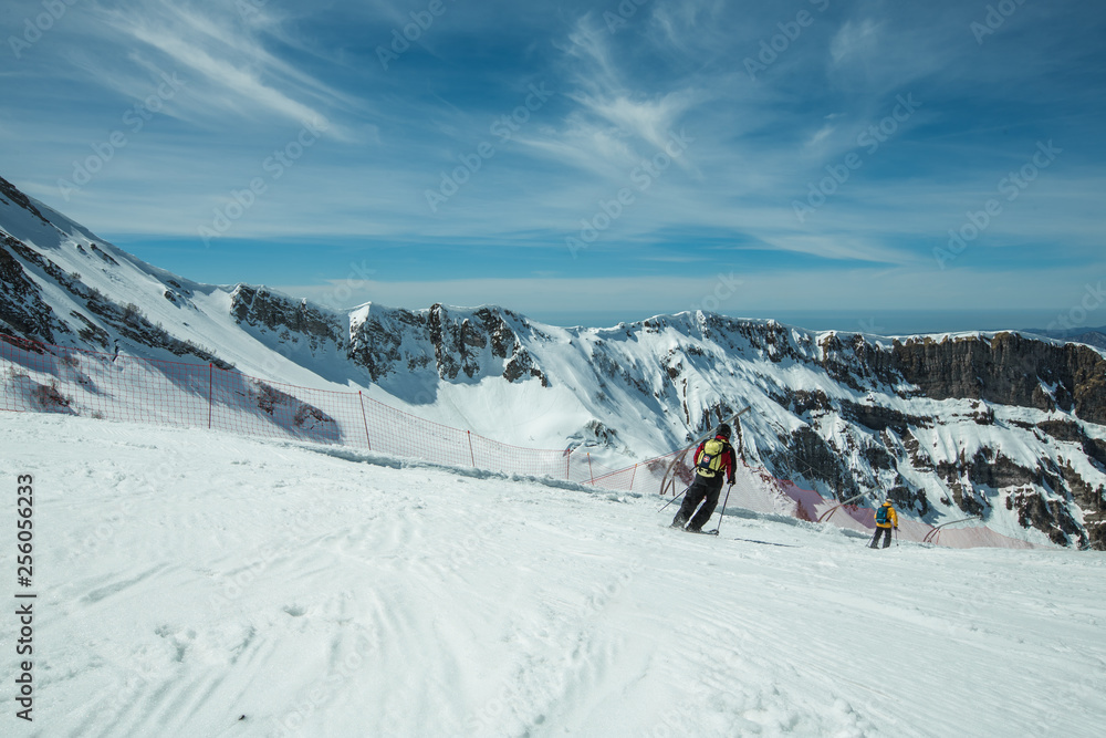 Russia, Sochi - ski resort, instructor is teaching a young girl to ski, Opening of the ski season,editorial.