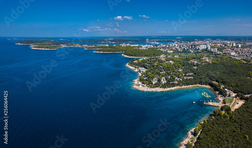 Aerial drone shot of Verudela bay near Pula, Croatia. A popular touristic destination.