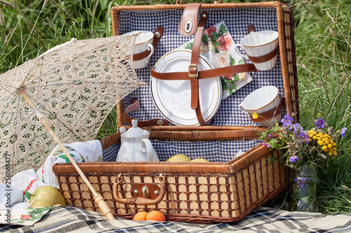 Set for a romantic picnic outdoors, in nature in summer photo