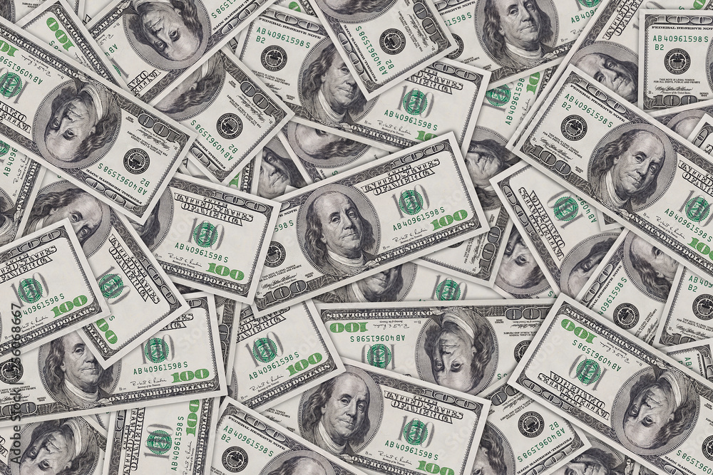 Background from of one hundred dollar banknotes Background from of one hundred dollar banknotes