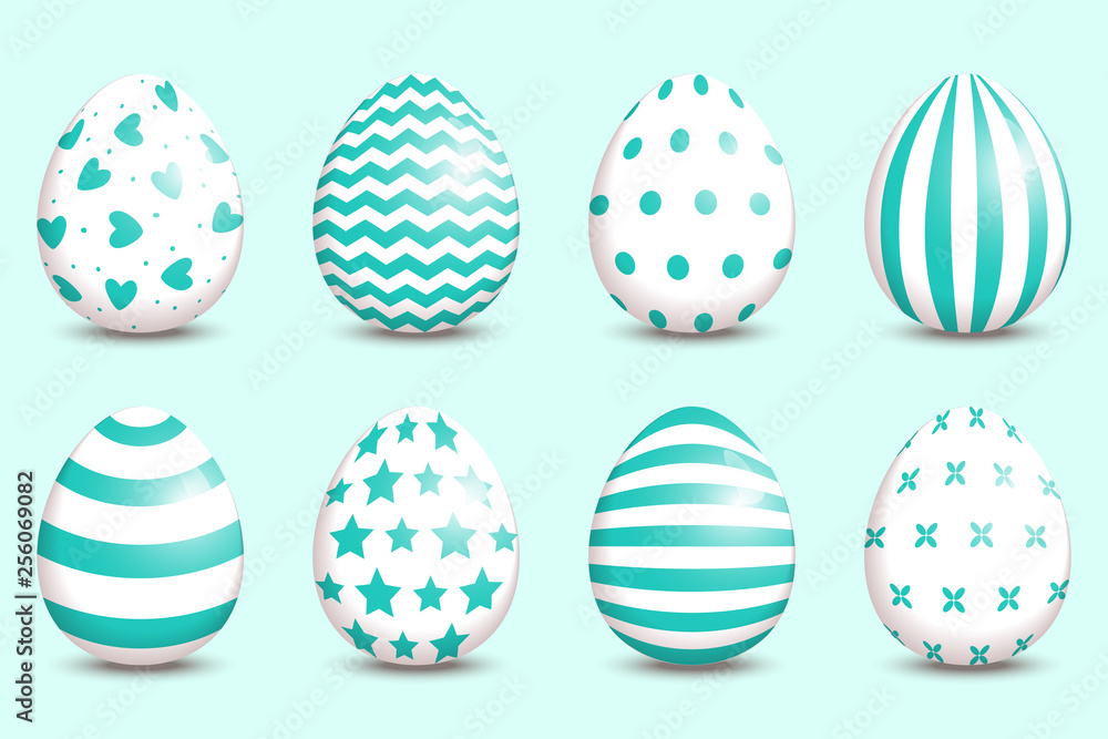 Set of realistic easter decorated eggs on turquoise background.