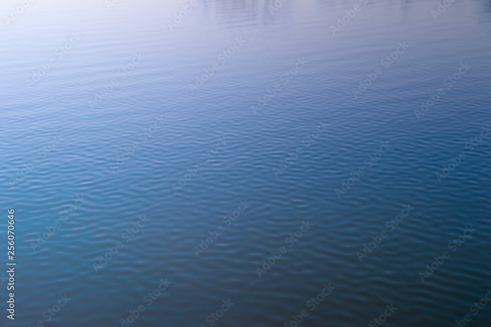 blue surface of water blue surface of water