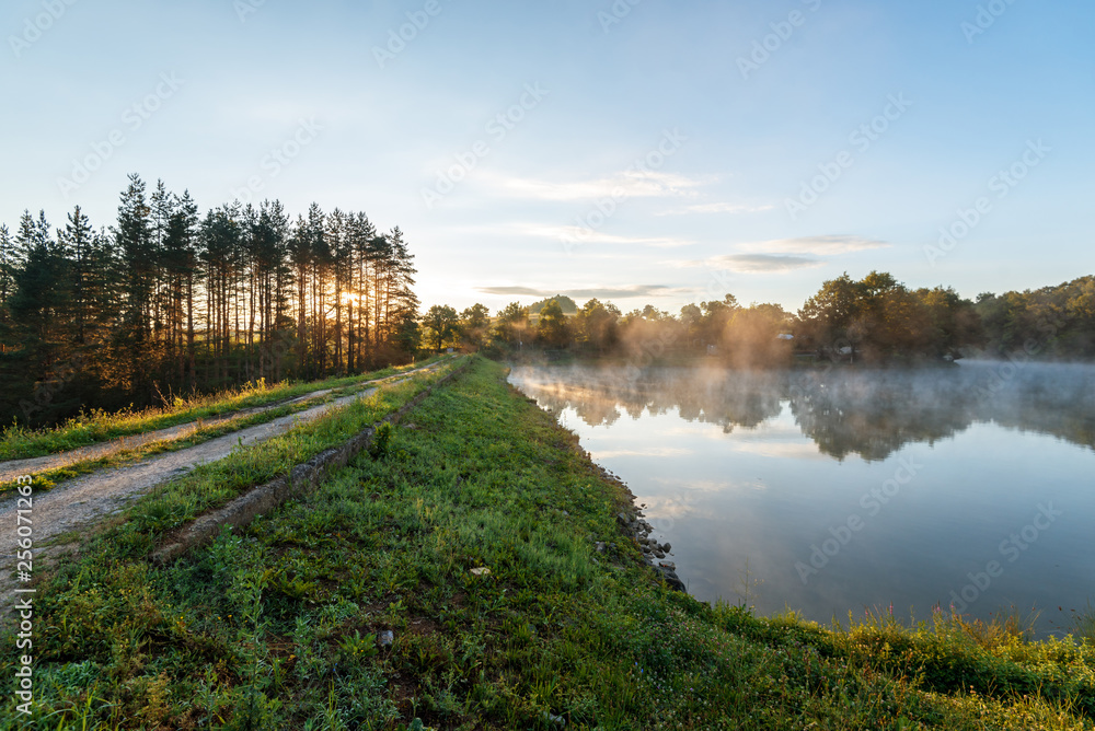 Morning fog on the forest lake. Morning fog on the forest lake.