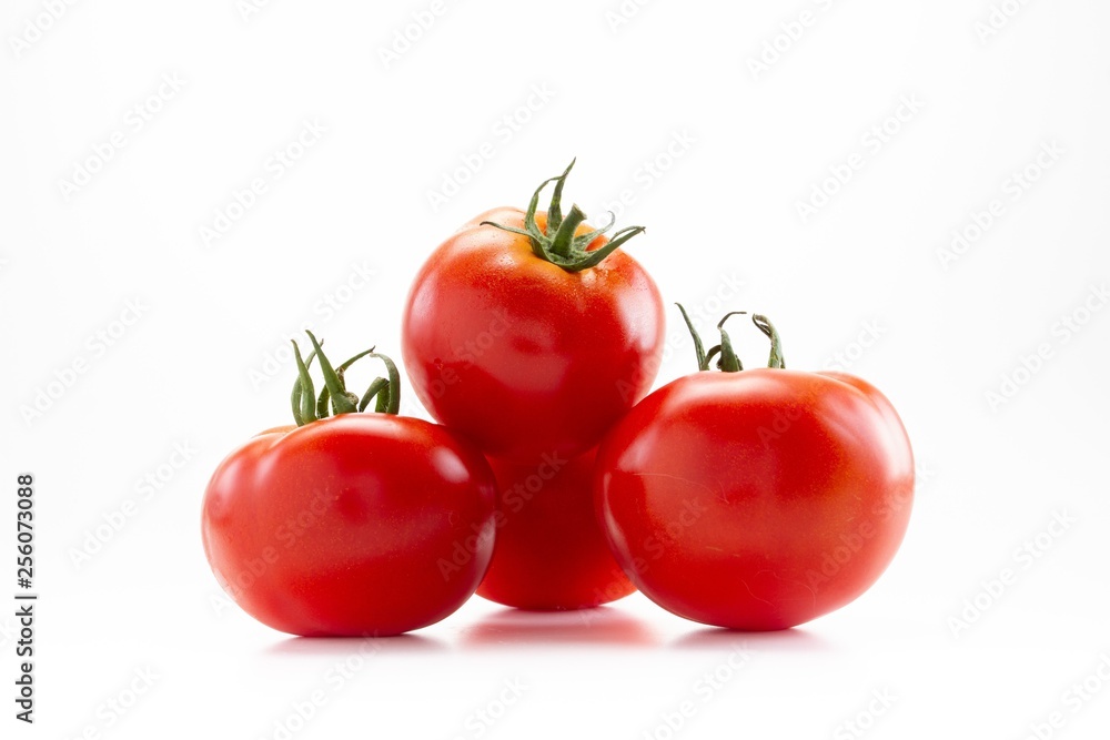 Red tomato raw ripe vegetable for food isolated on white, green. Red tomato raw ripe vegetable for food isolated on white, green.
