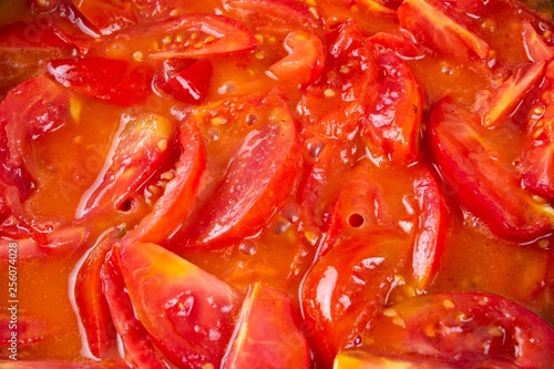 tomato frying on pan  cooking vegetable sauce   red.