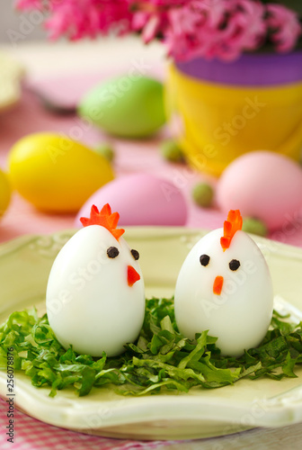 Funny chickens from eggs on the Easter table. © Anjelika Gretskaia