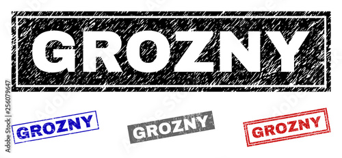 Grunge GROZNY rectangle stamp seals isolated on a white background. Rectangular seals with distress texture in red, blue, black and gray colors.