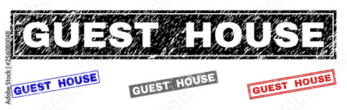 Grunge GUEST HOUSE rectangle stamp seals isolated on a white background. Rectangular seals with grunge texture in red, blue, black and grey colors.