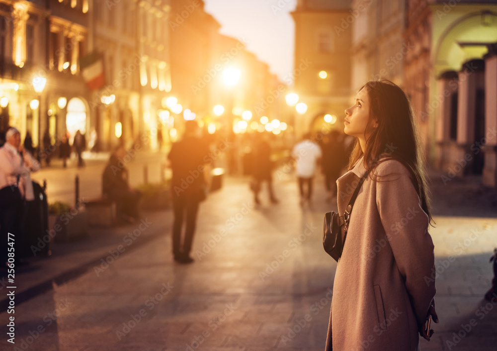 Beautiful girl in the evening on the street Beautiful girl in the evening on the street