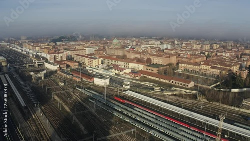 Bologna Centrale railroad station and tracks and city, Italy. Aerial shot photo