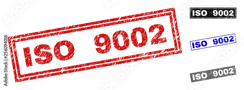 Grunge ISO 9002 rectangle stamp seals isolated on a white background. Rectangular seals with grunge texture in red, blue, black and gray colors.