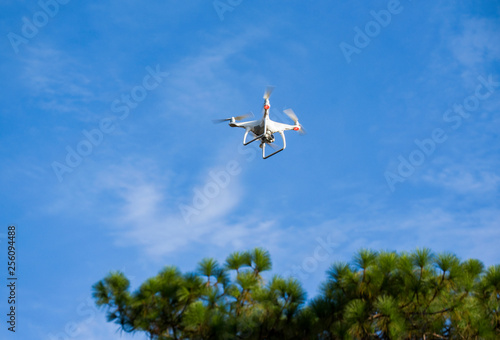 drone flying on the sky with camera / technology air and taking pictures for top view