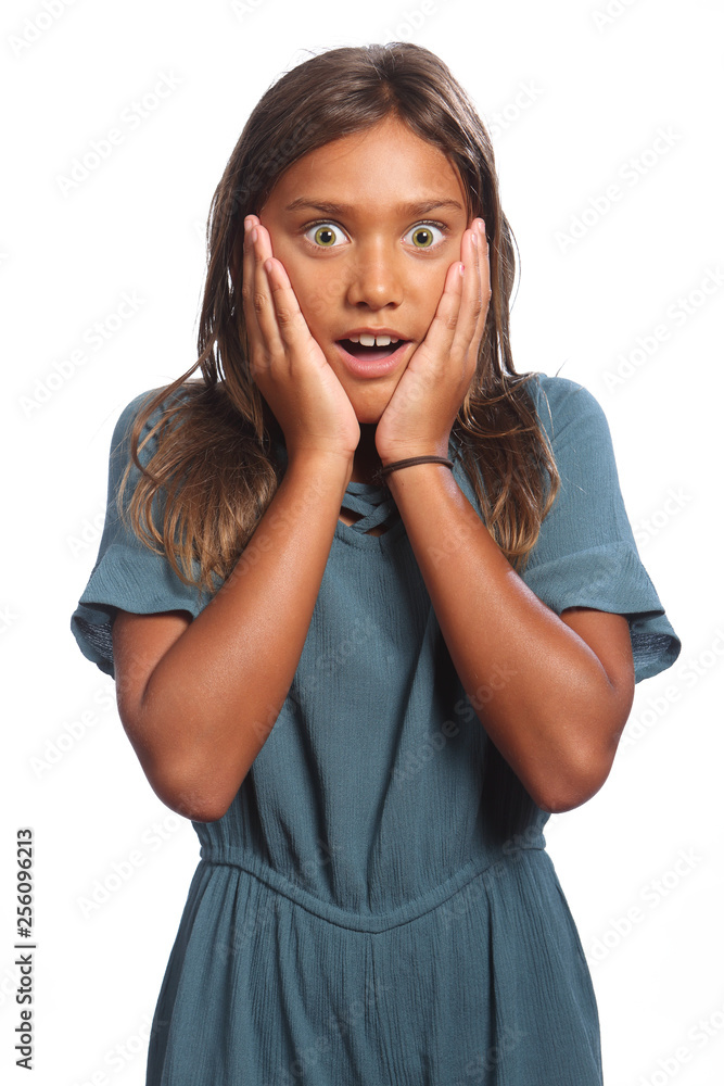 Young mixed race school girl surprised expression Young mixed race school girl surprised expression