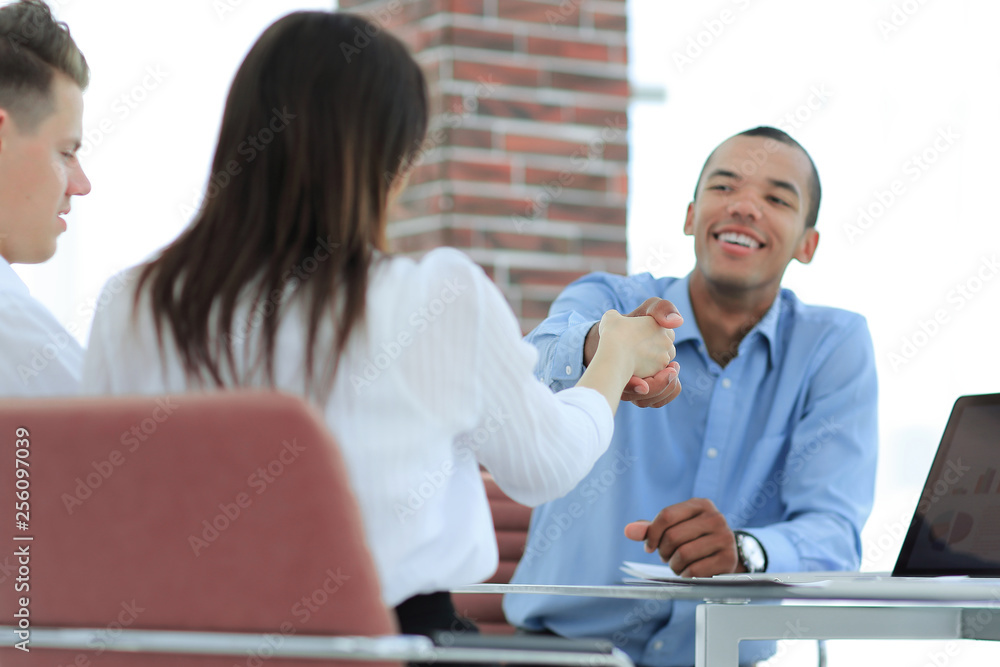 young entrepreneurs shaking hands with each other young entrepreneurs shaking hands with each other