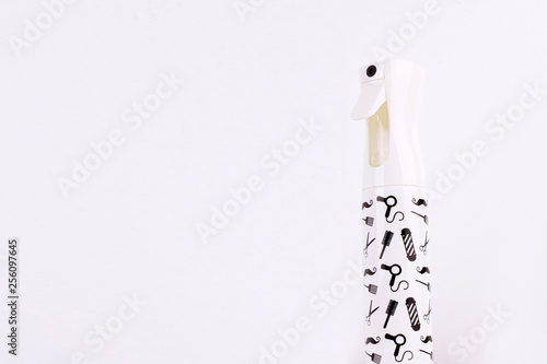 Hair spray bottle on white background