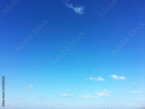 White clouds and blue sky background © tassita