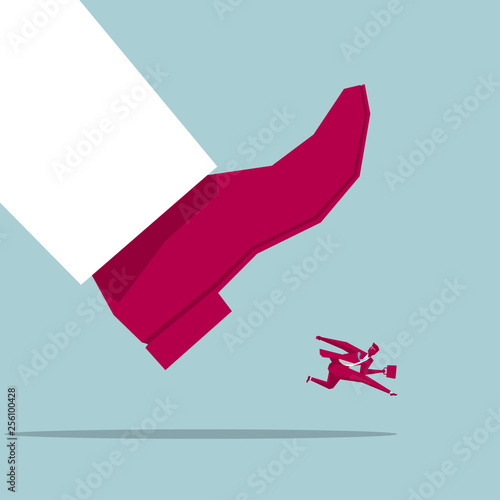 The businessman ran away at the huge foot. Isolated on blue background.