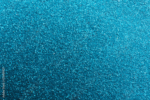 Closeup view of sparkling blue glitter background © New Africa