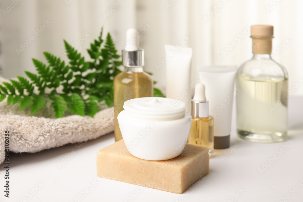 Composition with different body care products on table. Mockup for design