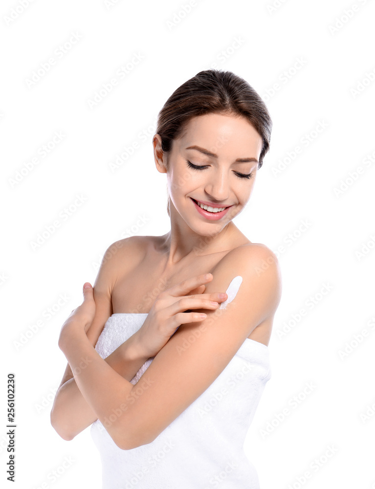 Young woman applying cream on white background. Beauty and body care Young woman applying cream on white background. Beauty and body care