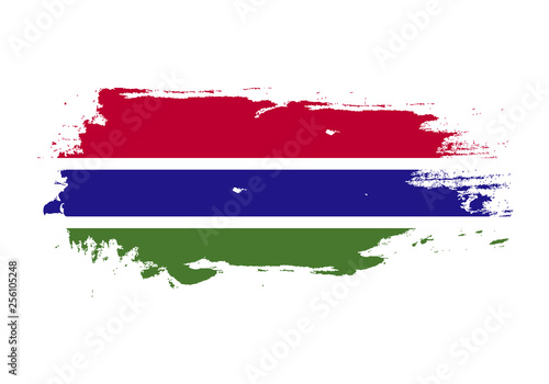 Grunge brush stroke with Gambia national flag. Watercolor painting flag. Symbol, poster, banner. Vector Isolated on white background.