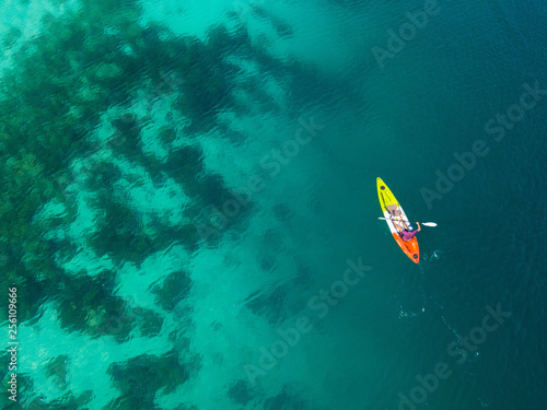 25 February 2019-Myanmar::tourist kayaking on clear water at Horse shoe island
