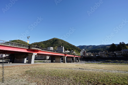 Gero Bridge across the Hida River in Gero Onsen, the famous onsen city in Gifu Prefecture, Japan.