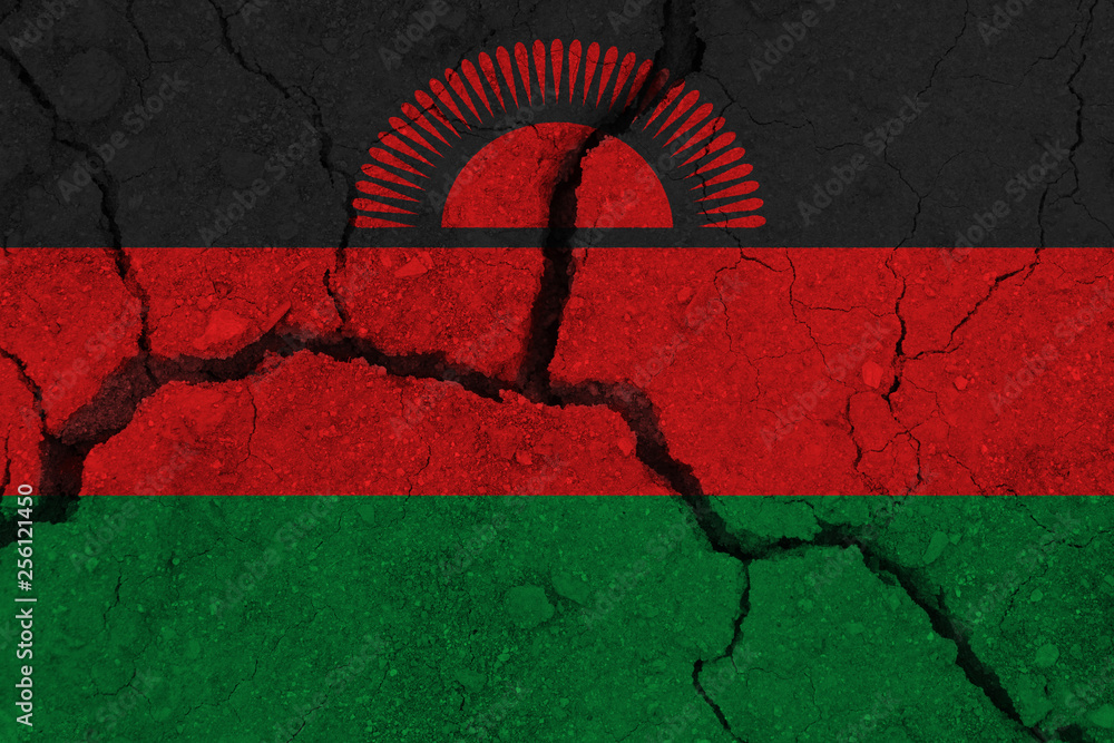 Malawi flag on the cracked earth