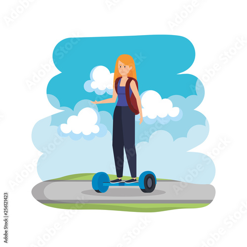 young woman in hoverboard electric on road