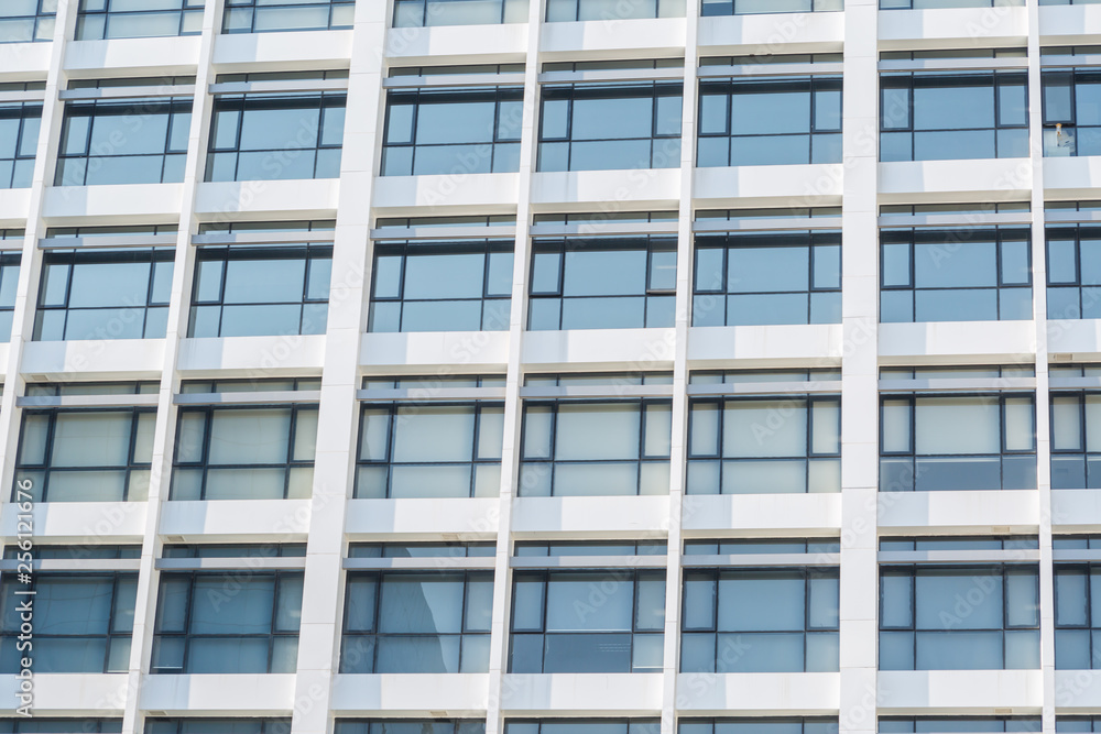 Windows of white building Windows of white building