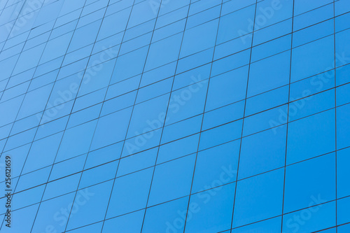 Modern office building with  blue glass windows