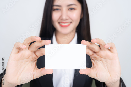 business woman  holding and showing empty business card or name card - business concept