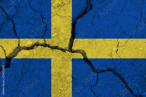 Sweden flag on the cracked earth