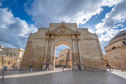 Naples gate (Porta Napoli) the entrance to the old town of Lecce, Apulia, Italy, region Puglia