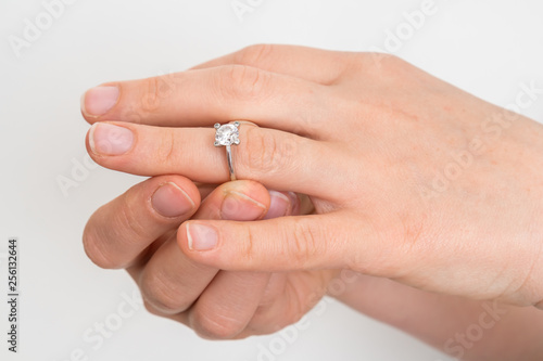 Woman take off wedding ring