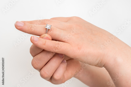 Woman take off wedding ring