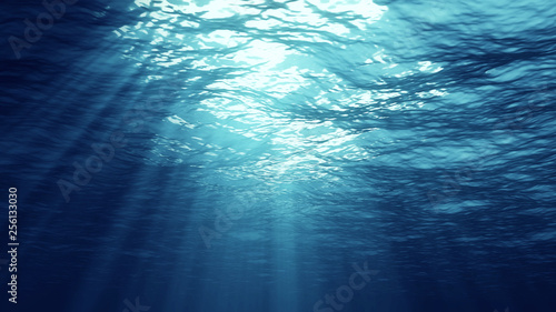 3D rendering of underwater light creates a beautiful solar curtain. Underwater ocean waves oscillate and flow with the rays of light
