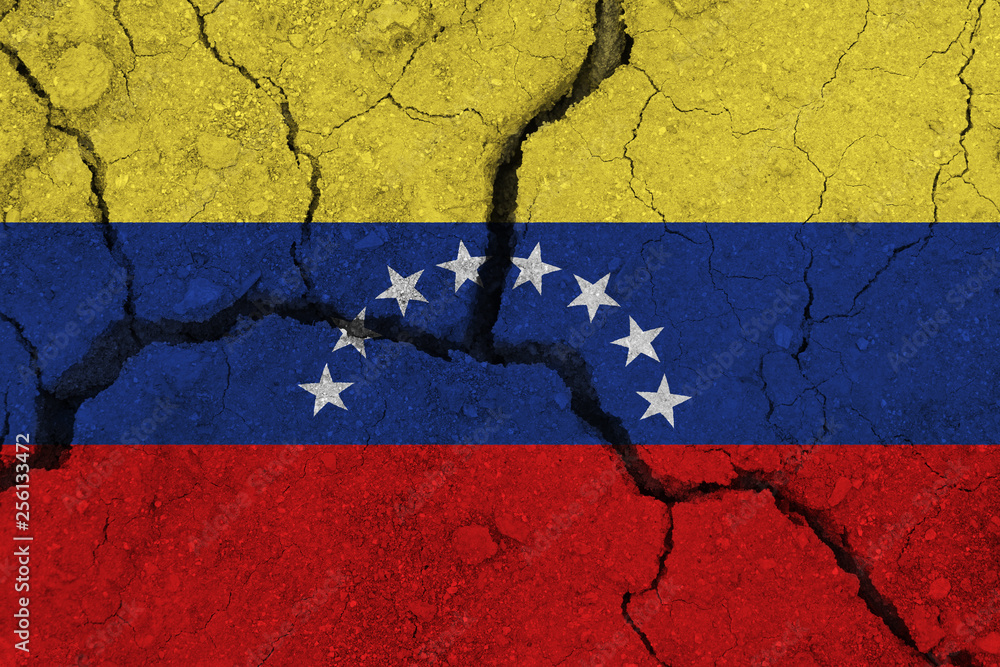 venezuela flag on the cracked earth