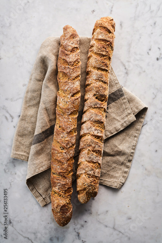 Freshly baked baguette loaves photo