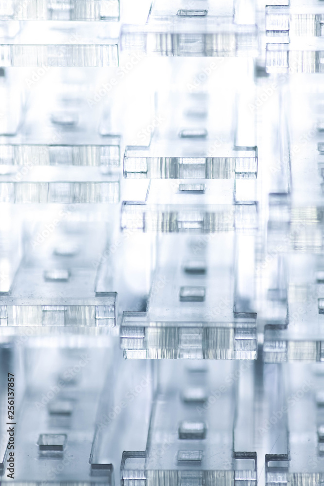 Abstract high-tech geometrical background. Details of transparent plastic or glass. Laser cutting of plexiglass or 3d printing. Abstract high-tech geometrical background. Details of transparent plastic or glass. Laser cutting of plexiglass or 3d printing.