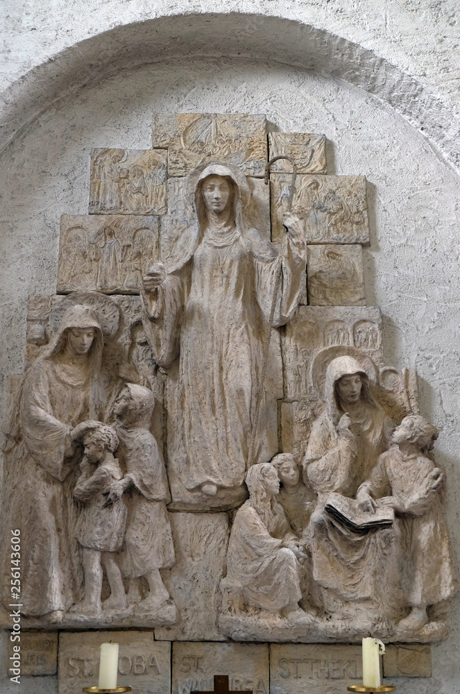 Obraz premium Saints Lioba of Tauberbischofsheim, Walburga of Heidenheim and Thekla of Kitzingen, altar in Munsterschwarzach Abbey, Benedictine monastery, Germany