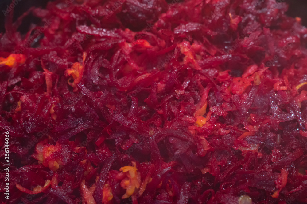 Roasting vegetables in a frying pan. Roasting beets with onions and carrots Roasting vegetables in a frying pan. Roasting beets with onions and carrots