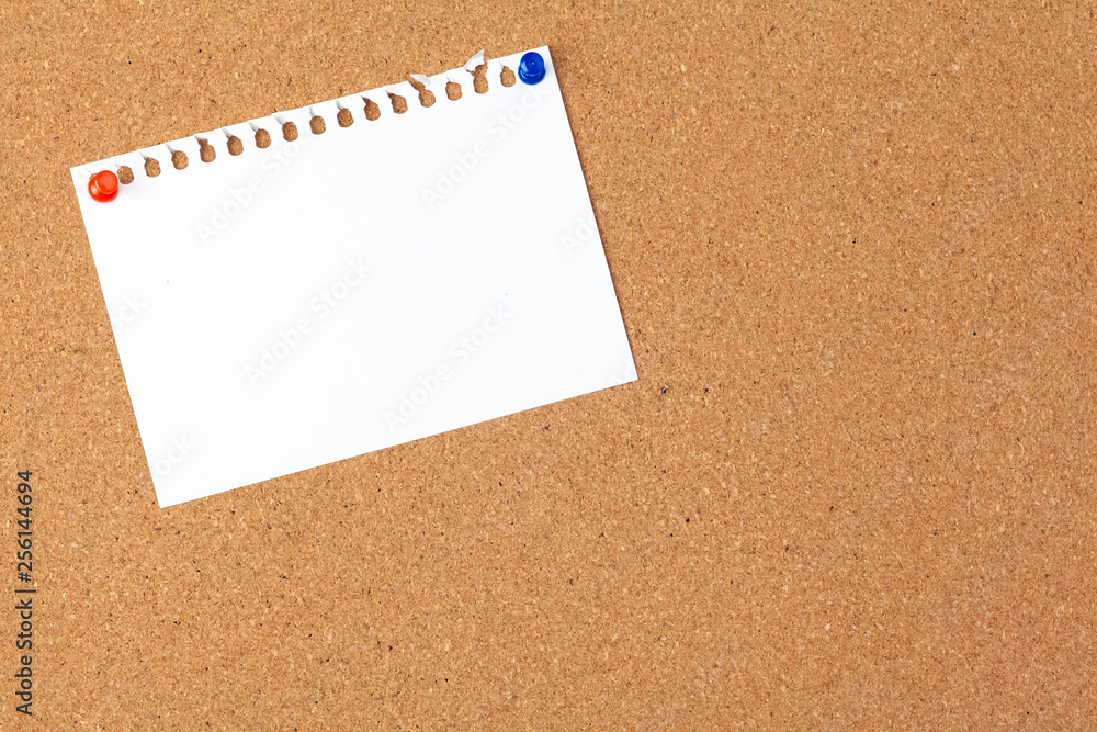 note paper pined on brown cork board background note paper pined on brown cork board background