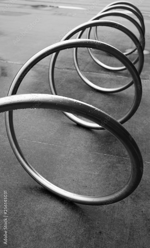 Black and white image of a spiral bicycle rack Black and white image of a spiral bicycle rack
